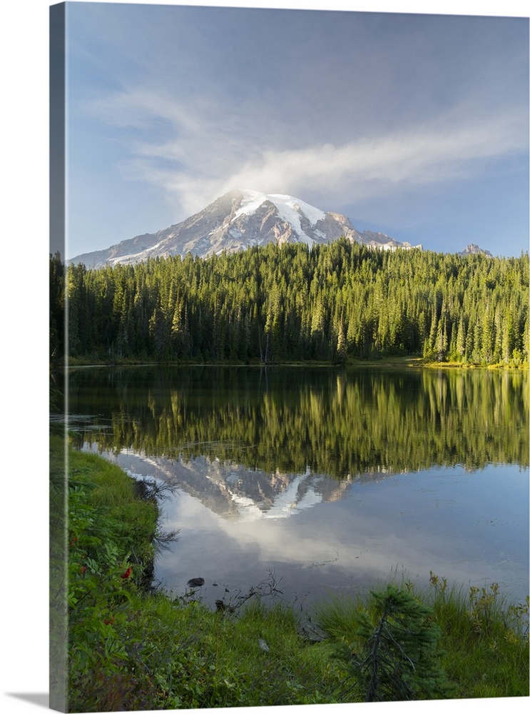Washington State, Mount Rainier National Park. Mount Rainier and clouds reflected in Reflection Lake.