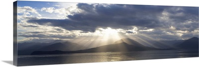 Washington State, Seabeck. Composite of God rays over Hood Canal