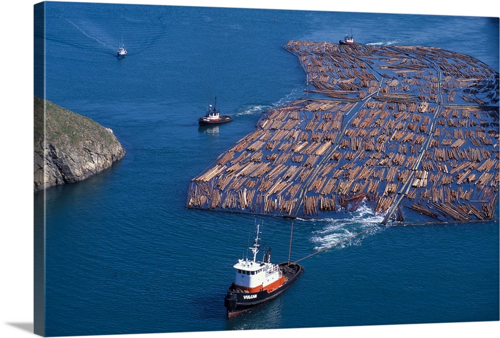 USA, Washington, Whidbey Island. Tug towing log boom through Deception Pass.