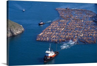 Washington, Whidbey Island, Tug towing log boom through Deception Pass