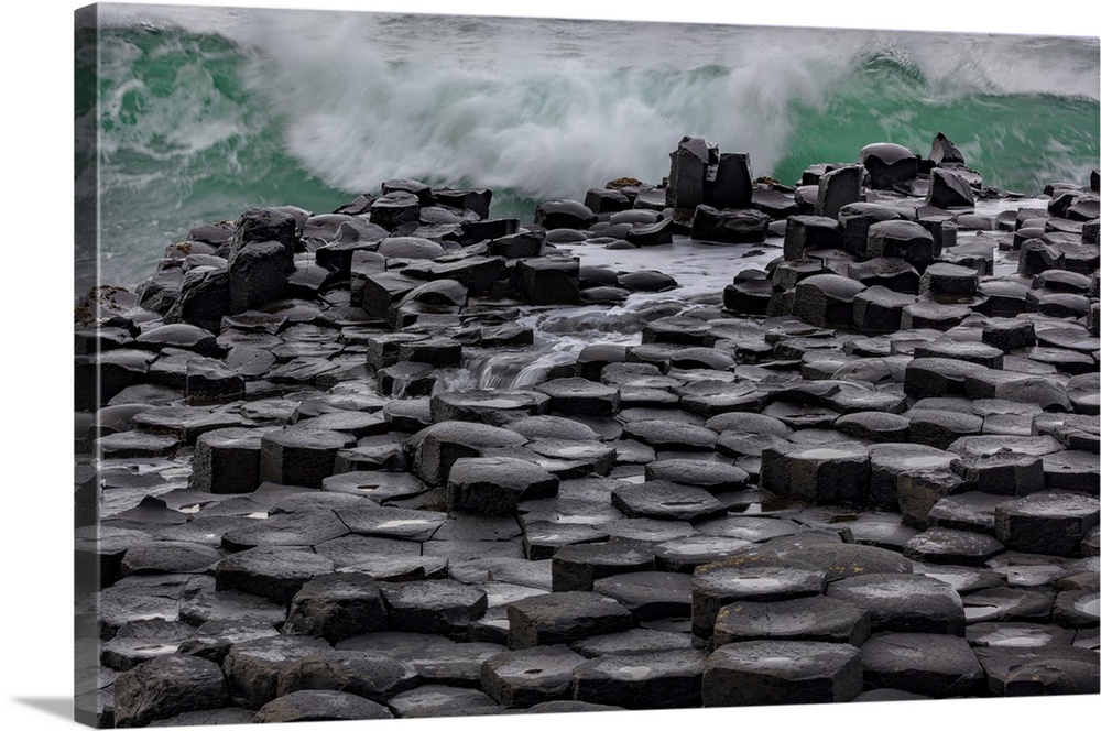 Waves crashing into basalt at the Giant's Causeway in County Antrim, Northern, Ireland