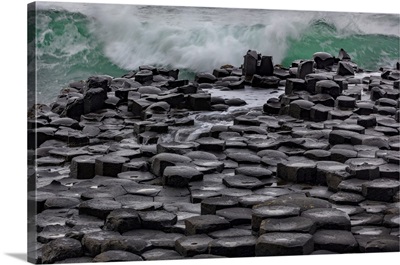 Waves Crashing Into Basalt At The Giant's Causeway In County Antrim, Northern, Ireland