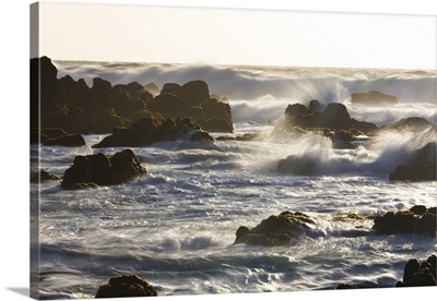 Waves crashing on the rocky California coast near Monterey, California