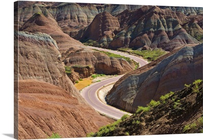 Winding Road Through The Colorful Mountains In Zhangye National Geopark, Gansu, China