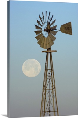 Windmill at sunrise with Full Moon, Canyon, Panhandle, Texas