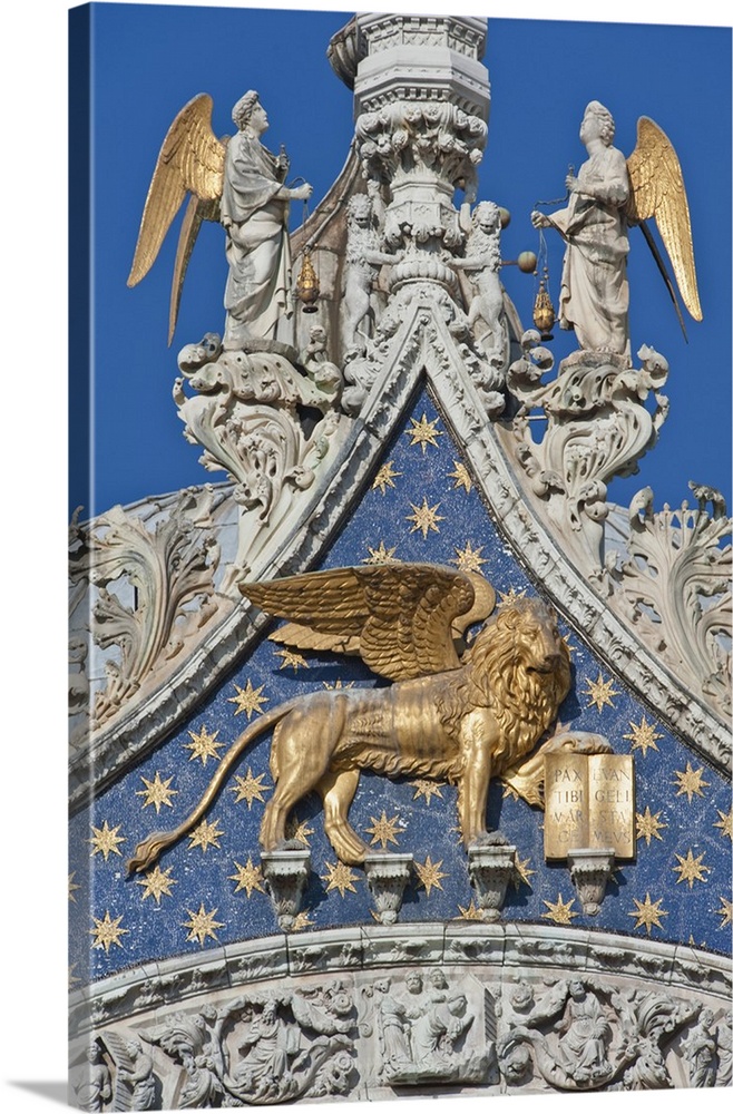 Europe, Italy, Venice, Winged Lion of St. Mark's on St. Mark's Basilica (Basilica di San Marco) - The winged lion is the s...