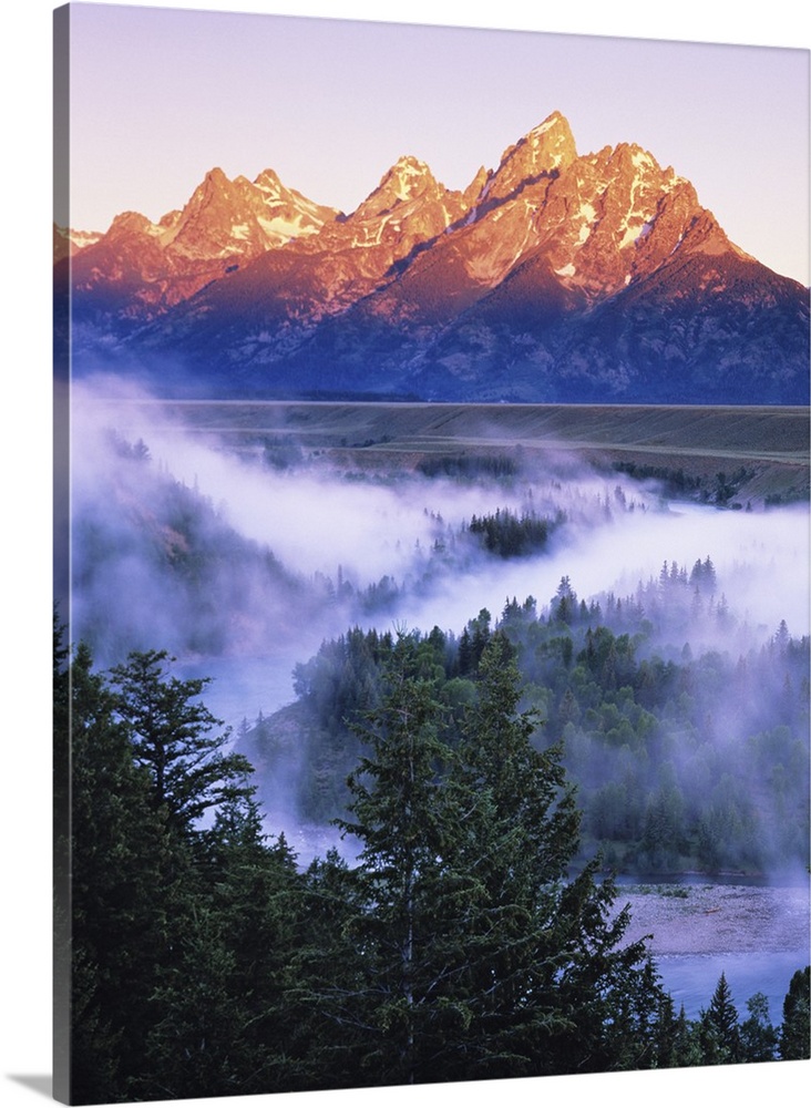 Misty mountain scenic seen from the Snake River Overlook at dawn. Grand Teton National Park, Wyoming.