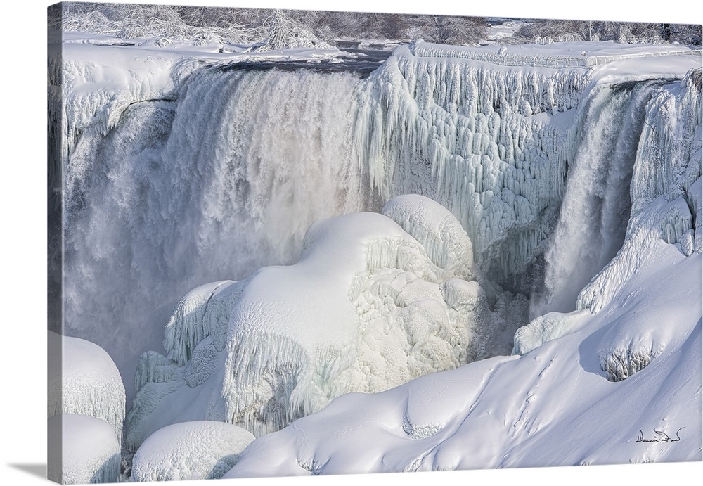 Niagara fall freezing over in a cold winter.