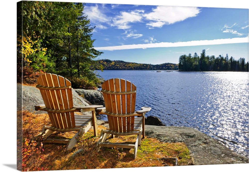 Adirondack chairs at shore of Lake of Two Rivers, Ontario, Canada.