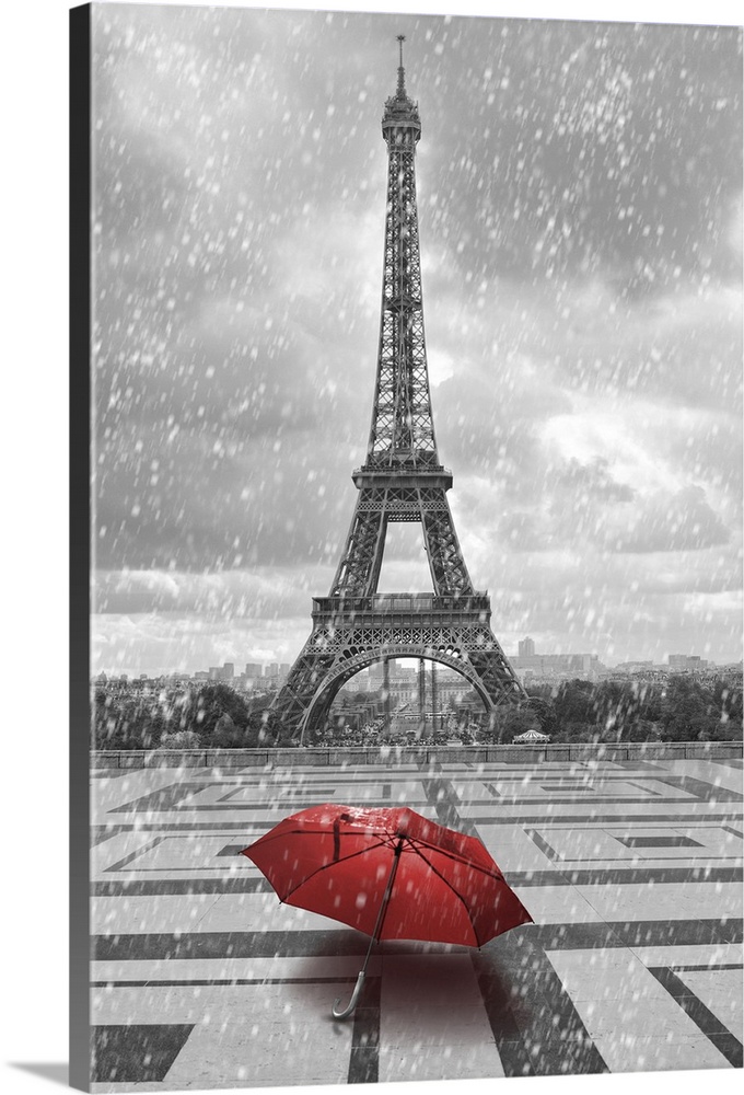 Eiffel tower in the rain with red umbrella. Black and white photo with red element.