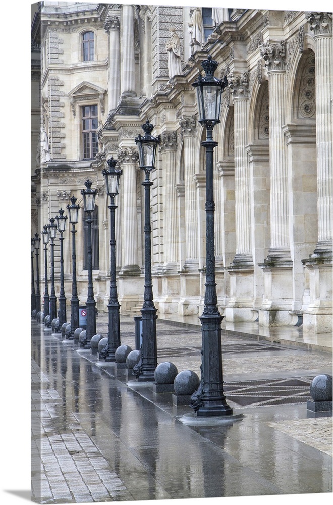 Metallic retro lampposts in historic Paris, France.
