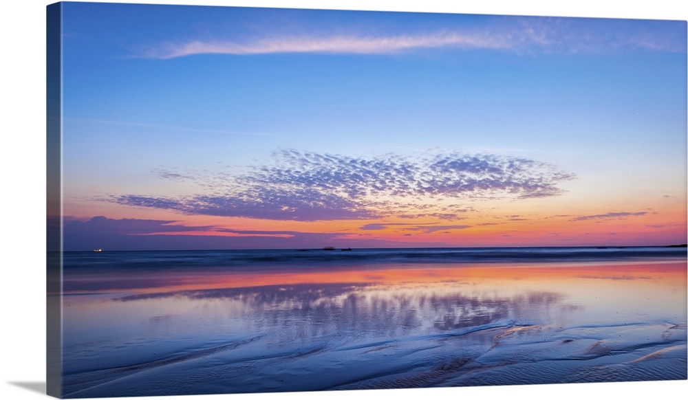 Panorama of sunset on beach. Goa, India.