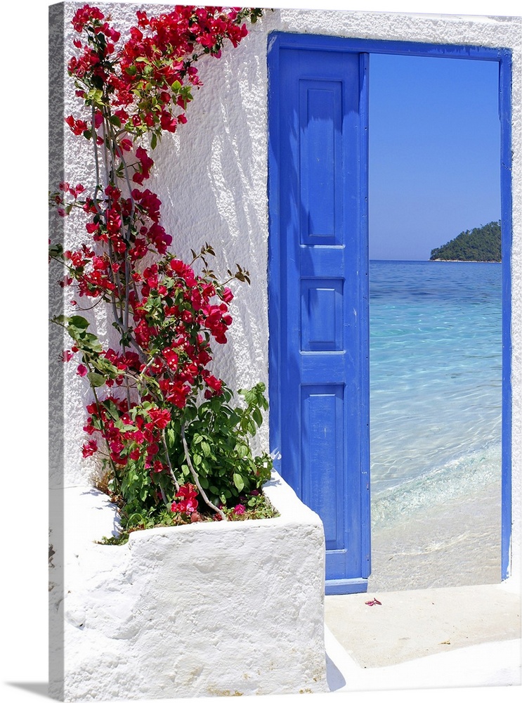 Traditional greek door with a great view in Santorini island, Greece.