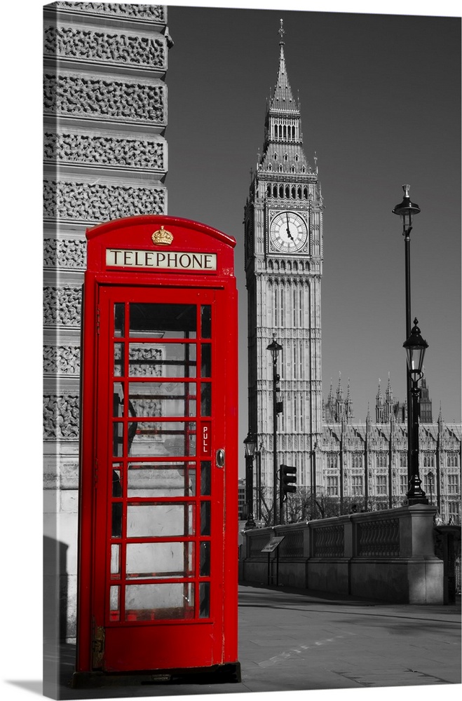Westminster phone box in color with the palace of Westminster in black and white in the background.