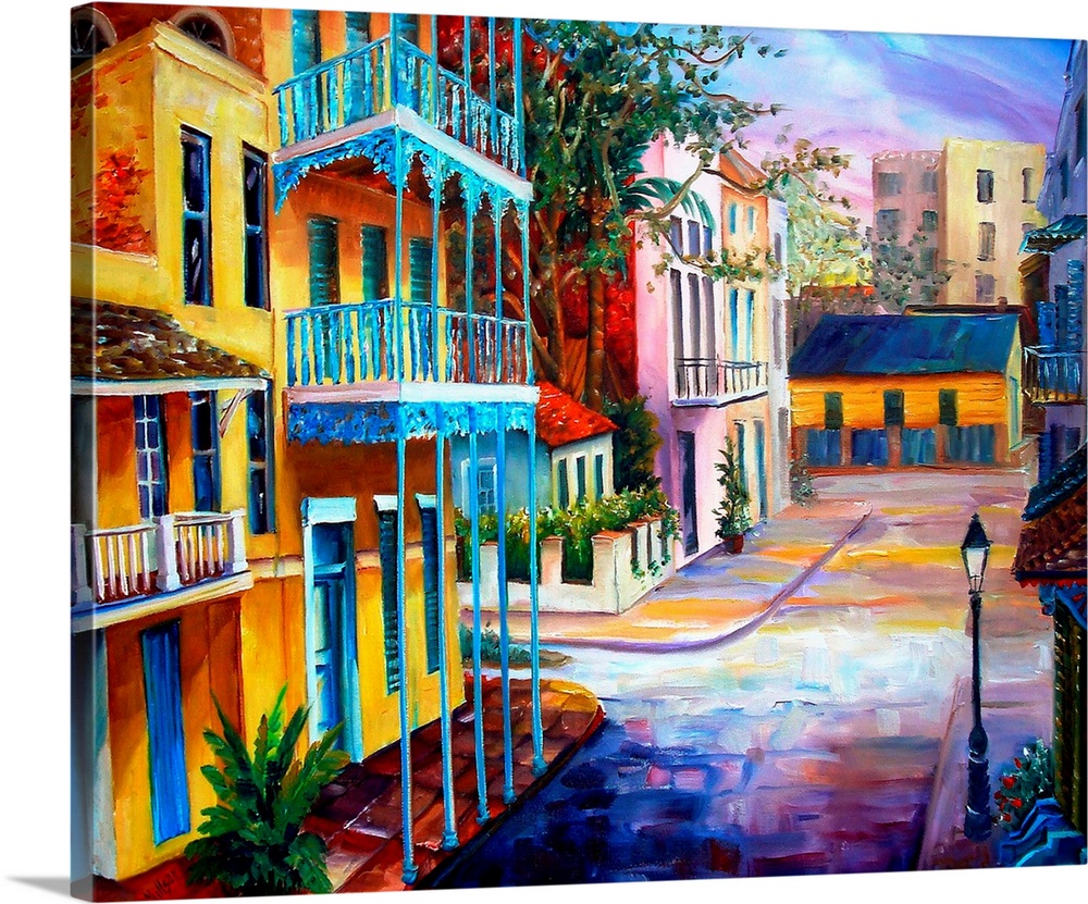 Landscape painting on a large wall hanging of the sun rising over the streets of French Quarter in New Orleans, Louisiana.
