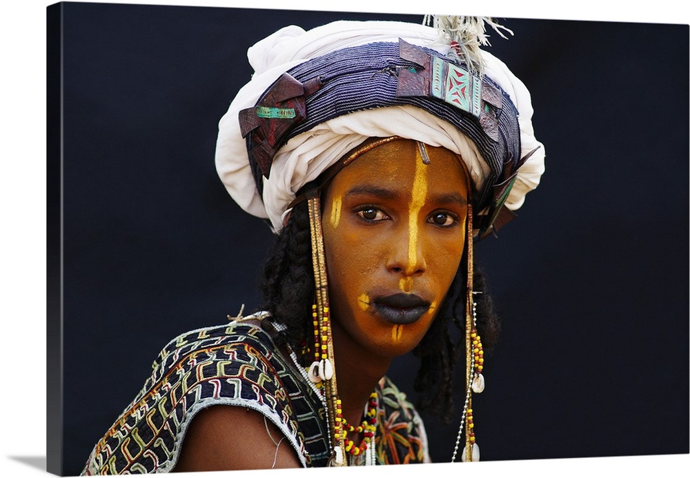 Niger, A Wodaabe-Bororo boy with his face painted for the annual Gerewol male beauty contest