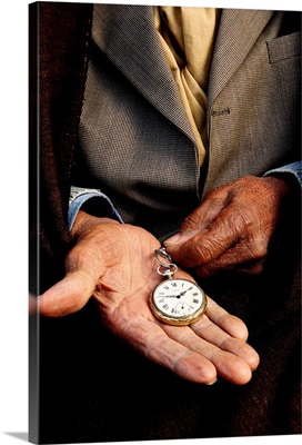 Africa, Tunisia, an old man shows his pocket watch