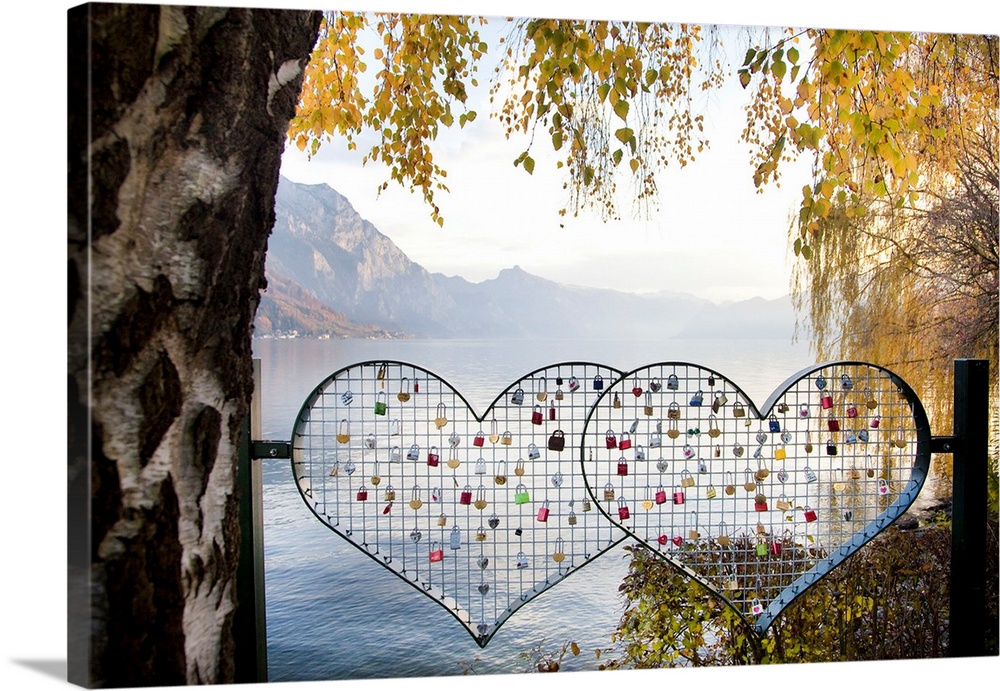 Austria, Upper Austria, Gmunden, Metal hearts behind Ort Castle on Lake Traunsee: padlocks as symbols of eternal love prom...