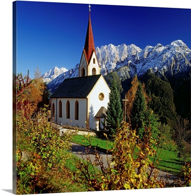 Austria, Tirol, Bannberg church and Lienzer Dolomite mountains in background