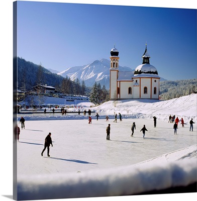 Austria, Tyrol, Seefeld village, ice skating and Seekirche