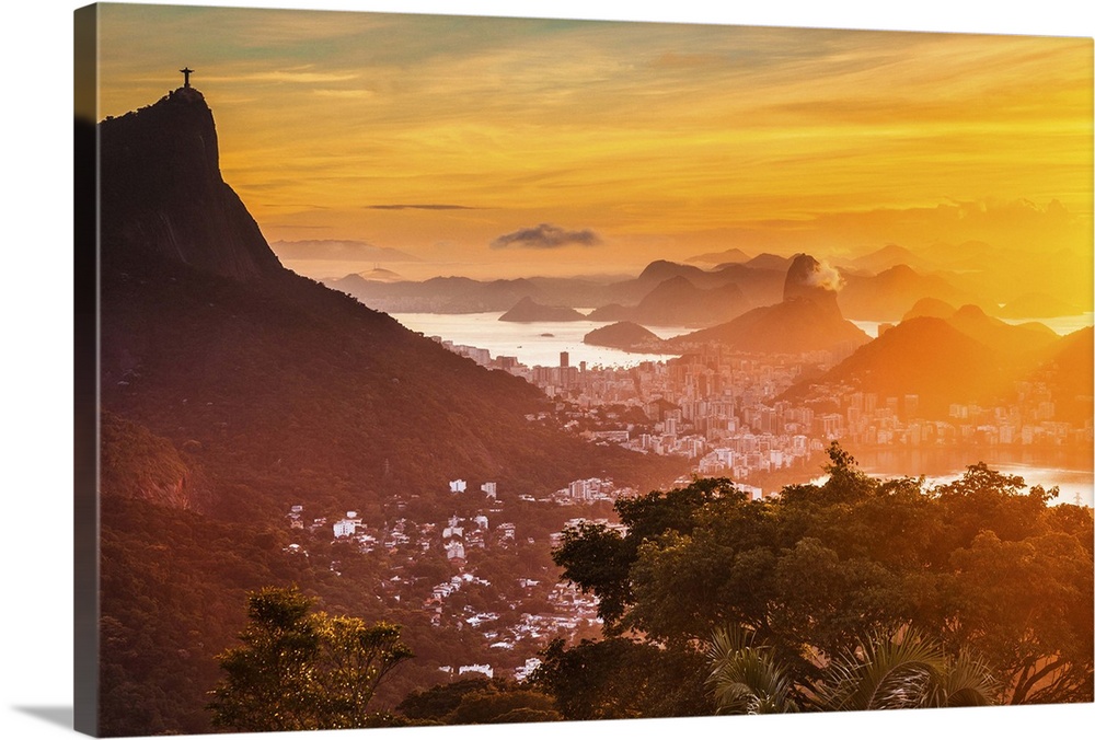 Brazil, Rio de Janeiro, Corcovado, Christ the Redeemer, Cityscape at sunrise with Corcovado, Cristo Redentor, Sugarloaf Mo...