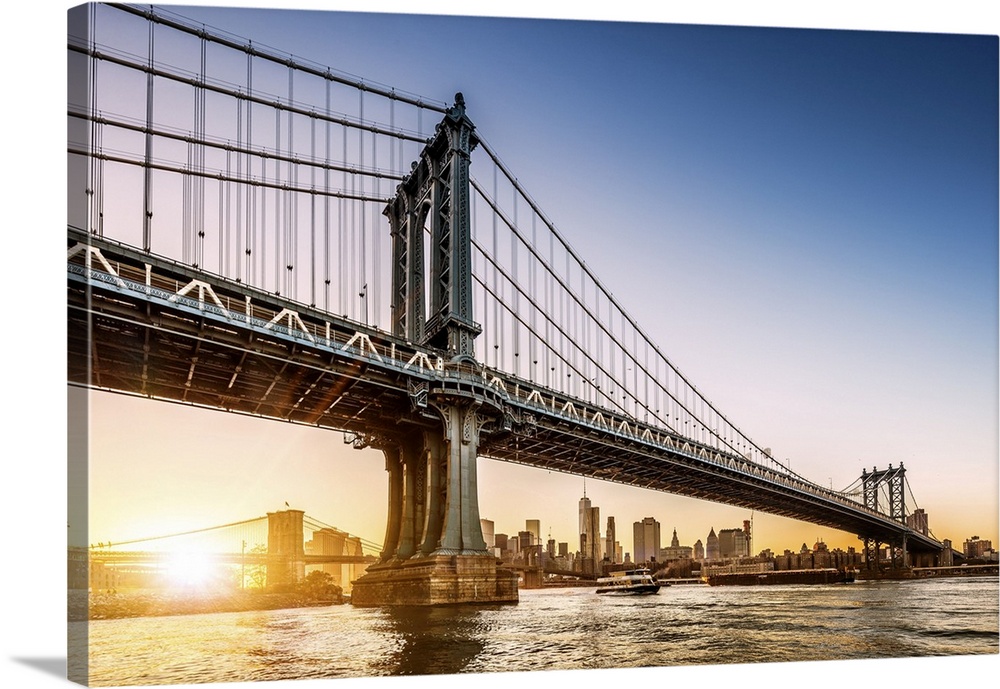 USA, New York City, East River, Brooklyn, Dumbo, Manhattan Bridge, Brooklyn Bridge and Freedom Tower in background at sunset