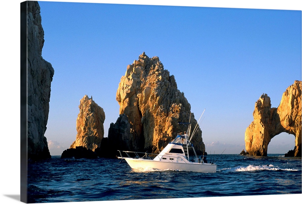 Mexico, Baja California....Los Cabos....City Cabo San Luca....The Cape San Luca with the arch....Fishermen going for big g...