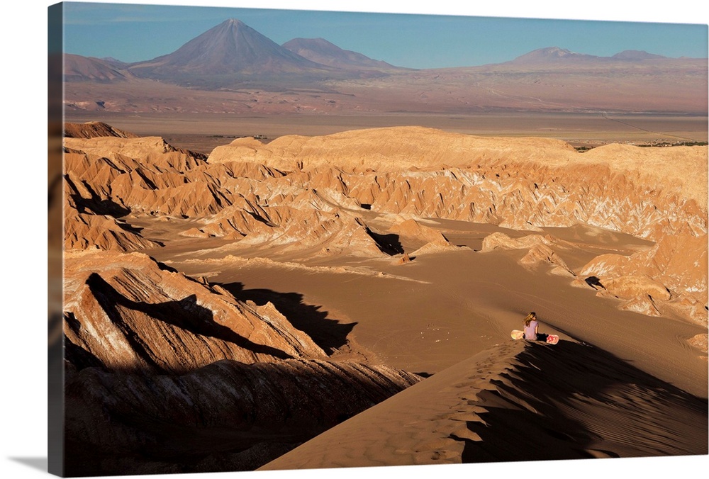 Chile, Antofagasta, Atacama Desert, San Pedro de Atacama, Sand surfing in the Death Valley with Licancabur volcano in the ...