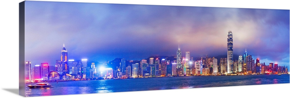 China, Hong Kong, Hong Kong island, City skyline with the International Financial centre and Four Seasons hotel at dusk.