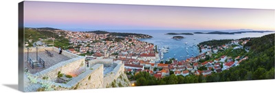 Croatia, Dalmatia, Hvar island, Lesina, Balkans, Harbor illuminated at dusk