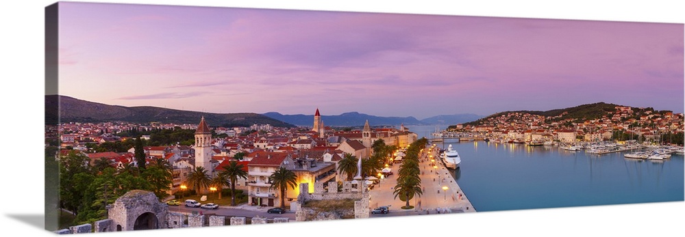 Croatia, Dalmatia, Trogir, Balkans, Adriatic Coast, Stari Grad (old town) illuminated at dusk.