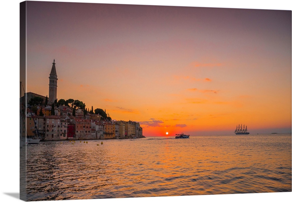 Croatia, Istria, Adriatic sea, Adriatic Coast, Mediterranean sea, Rovinj, Sailing ship and historical centre at sunset.