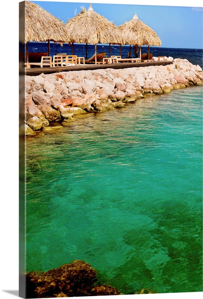 Curacao, huts by water at Blue Bay resort