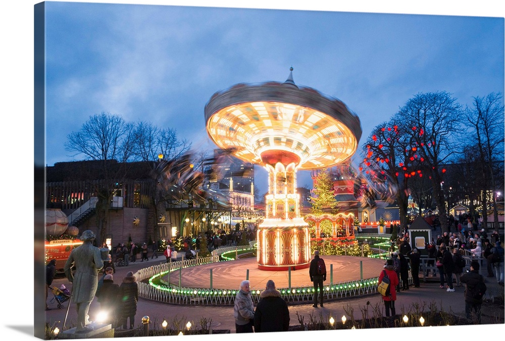 Denmark, Zealand, Copenhagen, Tivoli Gardens, Spinning carousel.