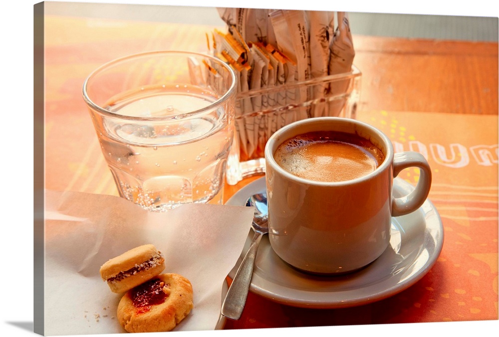 Display of espresso coffee and cookies