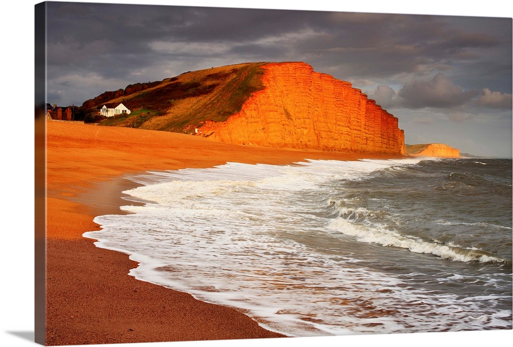 English Channel, Dorset, View of the red limestone cliffs at West Bay, near Bridport
