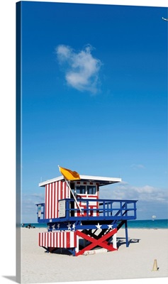 Florida, Miami Beach, A plane and a cloud over an American beach hut