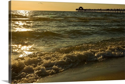 Florida, Naples, beach and Naples Pier at sunset