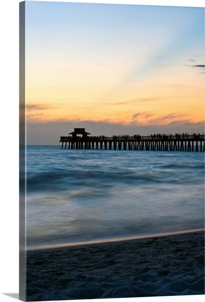 Florida, Naples, beach and Naples Pier at sunset.
