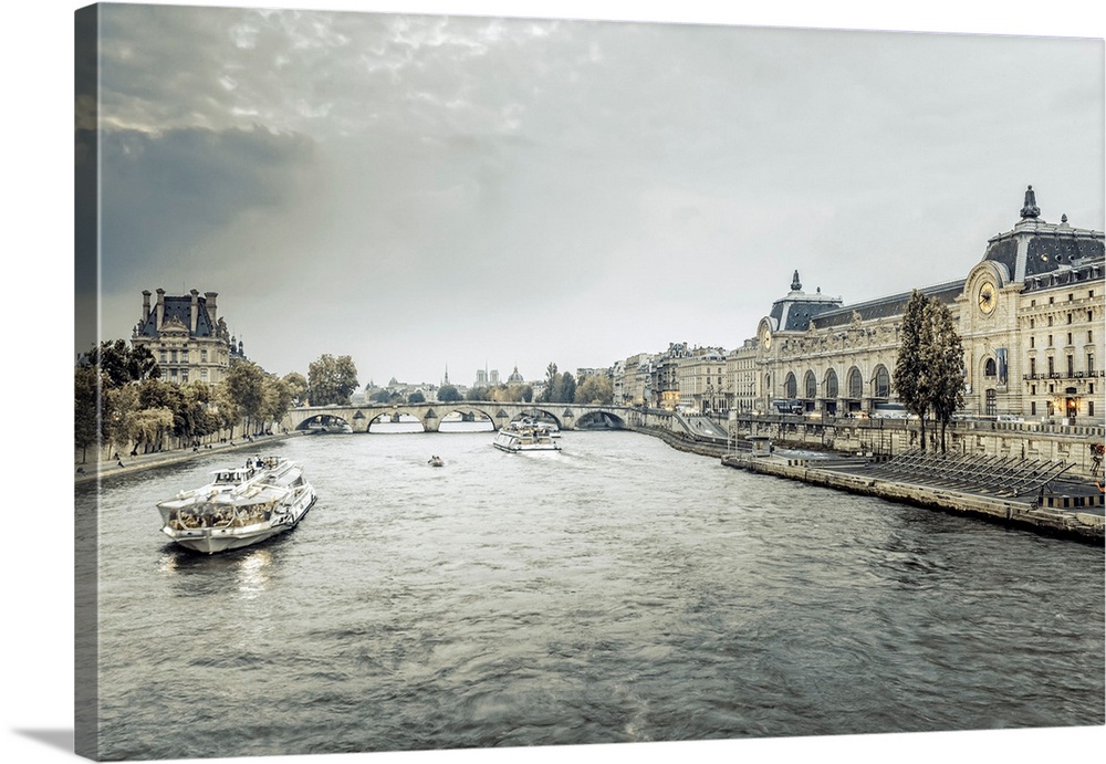 France, Paris, Exterior view of the Musee D'Orsay art gallery with River Seine, The Pont Royal and Bateaux Mouches.