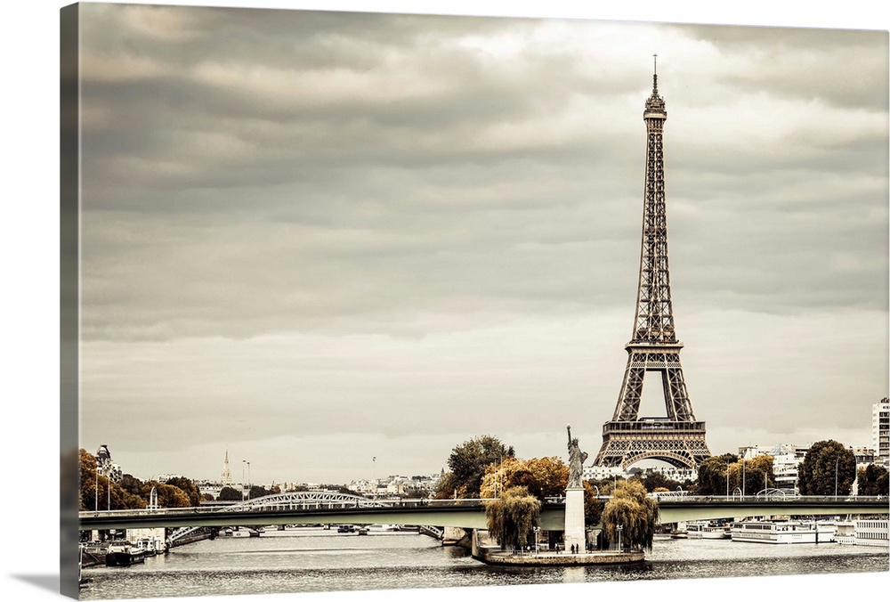 France, Paris, River Seine with Replica of the Statue of Liberty, and Eiffel Tower in the background.