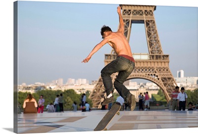 France, Paris, Skateboarding at the Palais de Chailot and Eiffel Tower