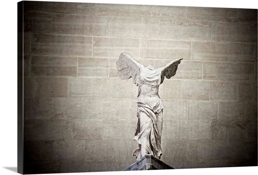 France, Paris, The Louvre, The Winged Victory of Samothrace, also called Nike of Samothrace.