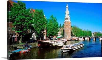 Holland, Amsterdam, Montelbaanstoren, cruise boat along canal