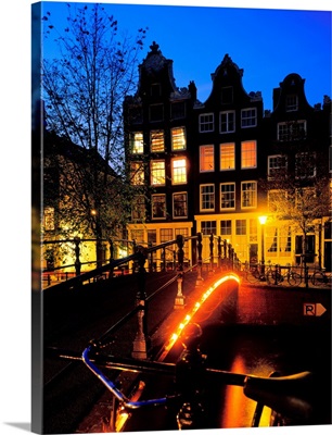 Holland, Amsterdam, typical house and bridge at night