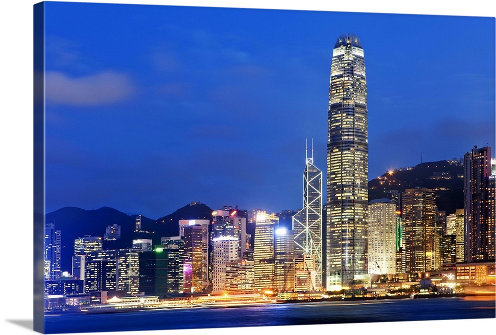 China, Hong Kong, Hong Kong island, City skyline illuminated at night with International Finance Center and Bank of China ...