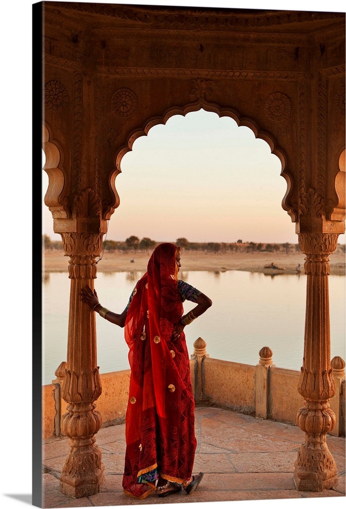 India, Rajasthan, Jaisalmer, Gadi Sagar lake, Woman wearing a sari on the lake.