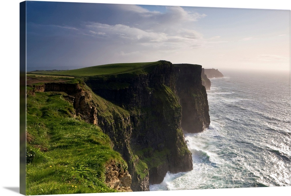 Ireland, Clare, The wild waves of Atlantic Ocean storms pound Cliffs of