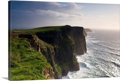Ireland, Clare, The wild waves of Atlantic Ocean storms pound Cliffs of Moher
