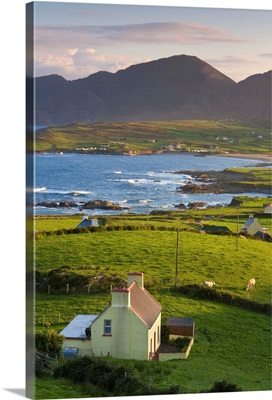 Ireland, Kerry, Sunrise over rural landscape of Ballydonegan Bay